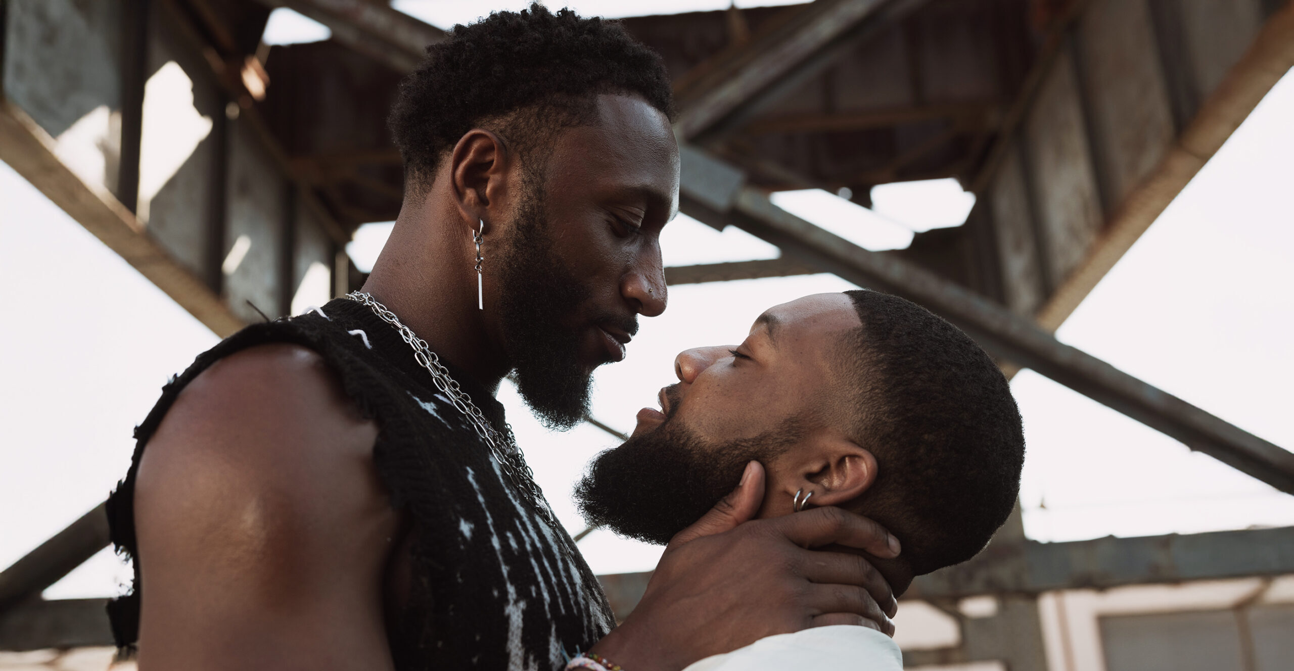 Image: "To Feel Seen" by photographer Dawn Hartman taken of a loving couple basking in each other's loving gaze, while exploring outdoor spaces for their photoshoot for the LGBT Intimacy Project. Visit LGBTintimacyproject.org